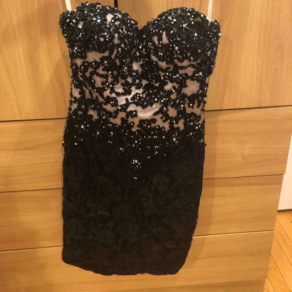 Tony Bowls Original. Size 4, worn once